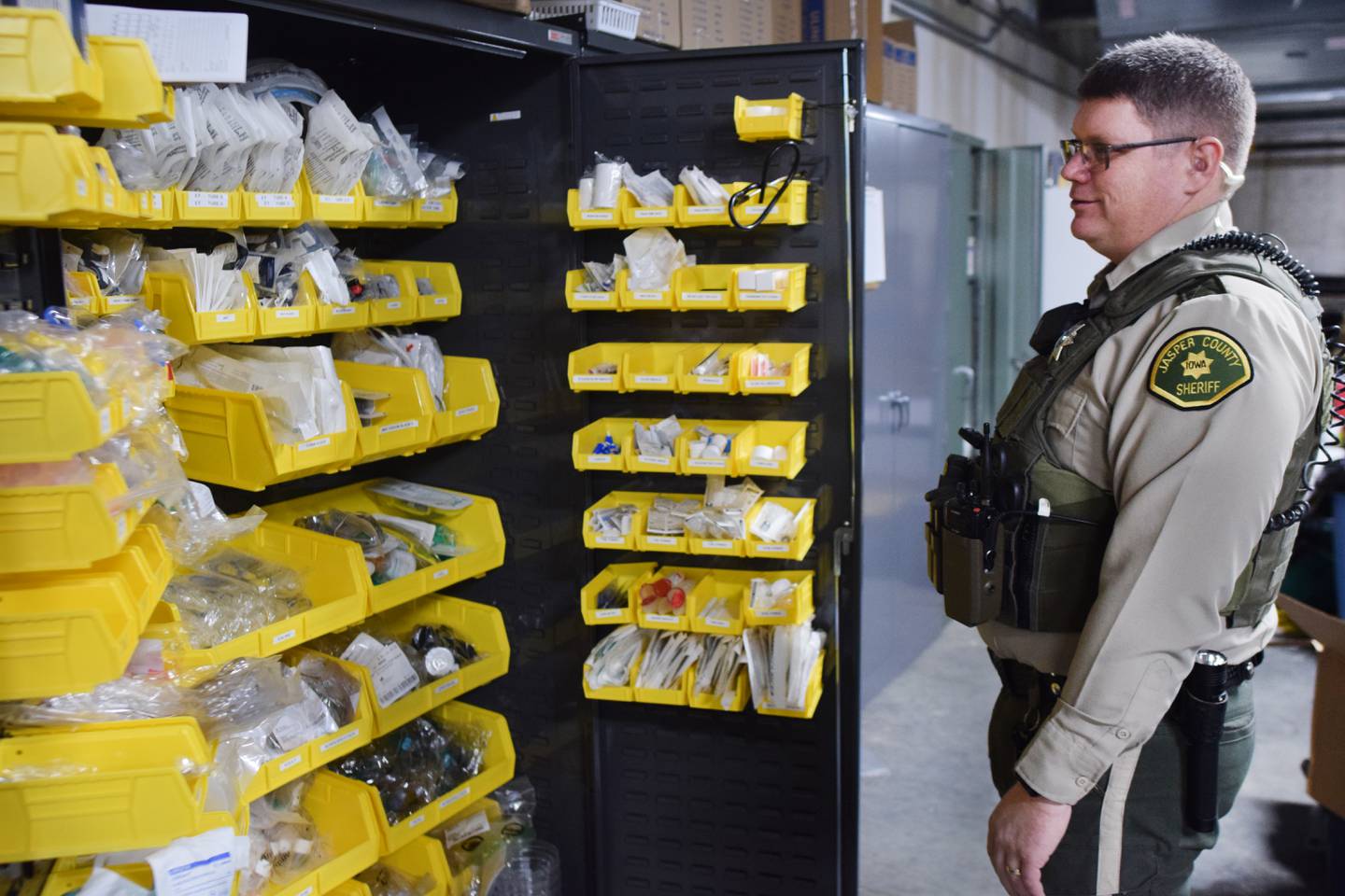 Steve Ashing, a reserve deputy paramedic for the Jasper County Sheriff's Office, showcases the extra medical supplies and equipment the sheriff's office routinely fills. Ashing is part of the advanced life support pilot program at the sheriff's office, which allows part-time reserve deputies with paramedic-level training to respond to emergency calls in rural areas and assist volunteer agencies.