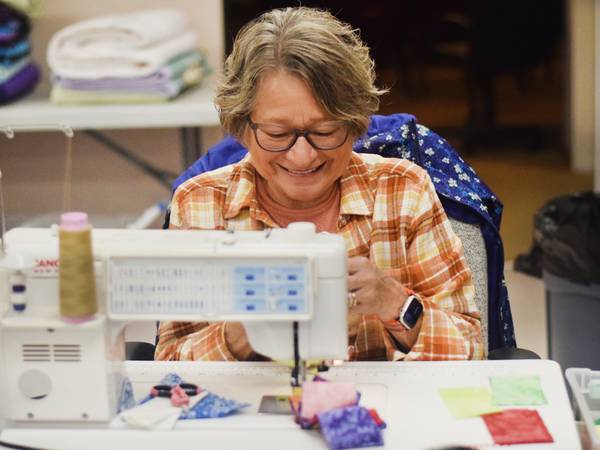 Photos: Members of 1/4-Inch Quilters prepare for Salvation Army Quilt Auction 