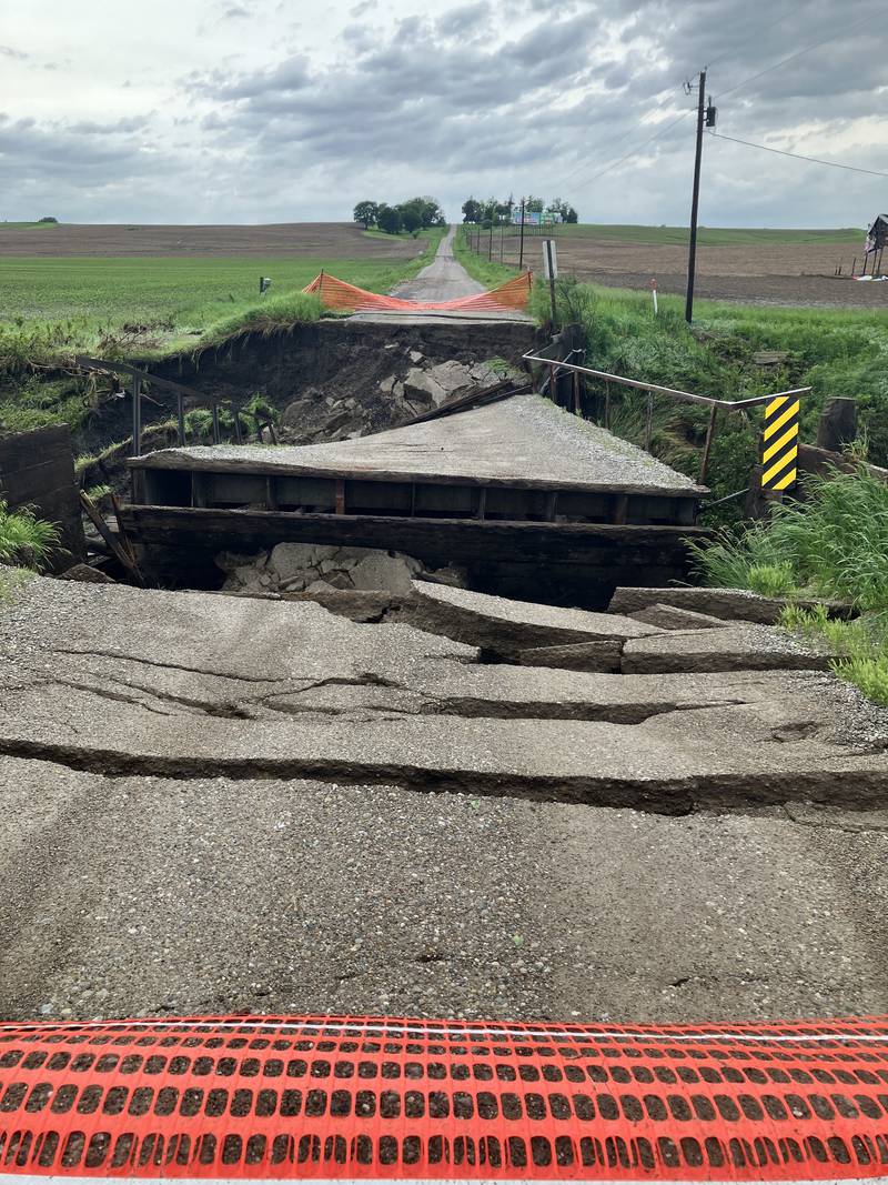 The bridge over Cherry Creek along South 24th Avenue East caved in as a result of floodwaters this past week. Jasper County Engineer Michael Frietsch said the bridge will likely not be repaired for another year.