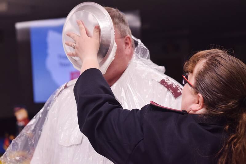 As a result of Rotary raising more funds for the Salvation Army than Kiwanis, Captain  Tim North voluntarily took a pie to the face during a volunteer recognition dinner April 19 at the organization's Newton headquarters.