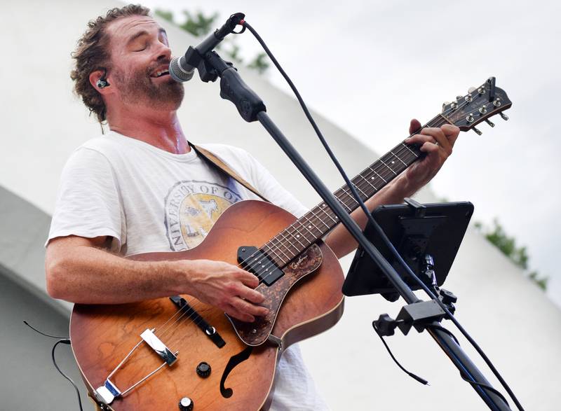 Damon Dotson, a Des Moines-based musician, performs the Maytag Bowl during the last night of Newton Fest on Saturday, June 10 at Maytag Park.