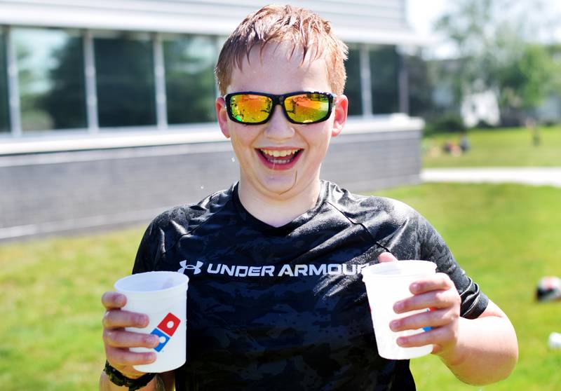 Eighth-grade students at Berg Middle School celebrate their last day as middle schoolers on May 26 by participating in carnival activities.