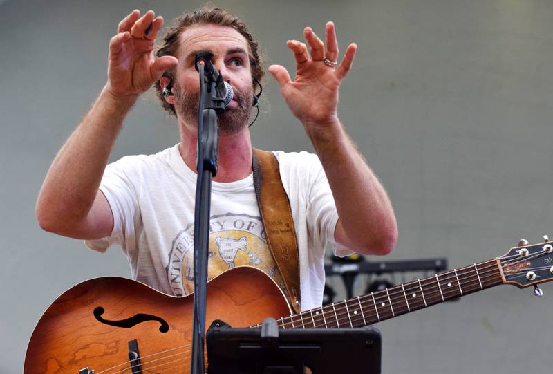 Damon Dotson, a Des Moines-based musician, performs the Maytag Bowl during the last night of Newton Fest on Saturday, June 10 at Maytag Park.