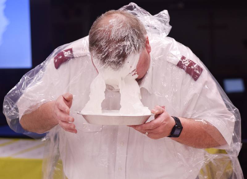 As a result of Rotary raising more funds for the Salvation Army than Kiwanis, Captain  Tim North voluntarily took a pie to the face during a volunteer recognition dinner April 19 at the organization's Newton headquarters.