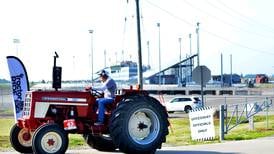 Iowa Speedway let farmers ride in style with WHO Great Tractor Ride