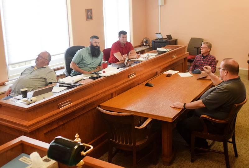 The Jasper County Board of Supervisors speak with county treasurer Doug Bishop at a past work session about sending an extra document with tax statements, which officials hope will give residents a better idea of how their tax money is distributed.