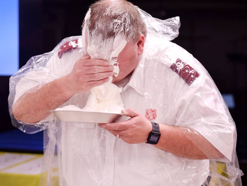 As a result of Rotary raising more funds for the Salvation Army than Kiwanis, Captain  Tim North voluntarily took a pie to the face during a volunteer recognition dinner April 19 at the organization's Newton headquarters.