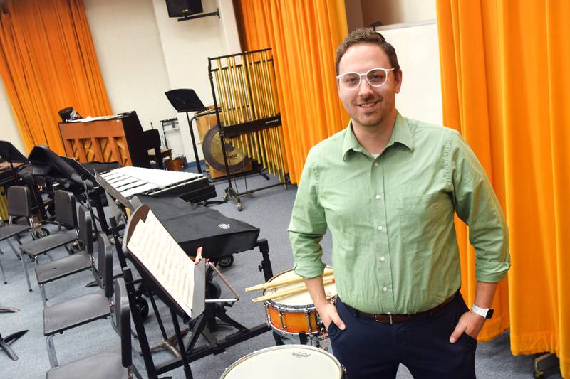 Adam Kallal's first year as the new band director of Newton High School has been an eventful one. Not only has he taken the program in a new direction with the amplified productions and emotional connections to the music, he also introduced indoor marching band to the school.