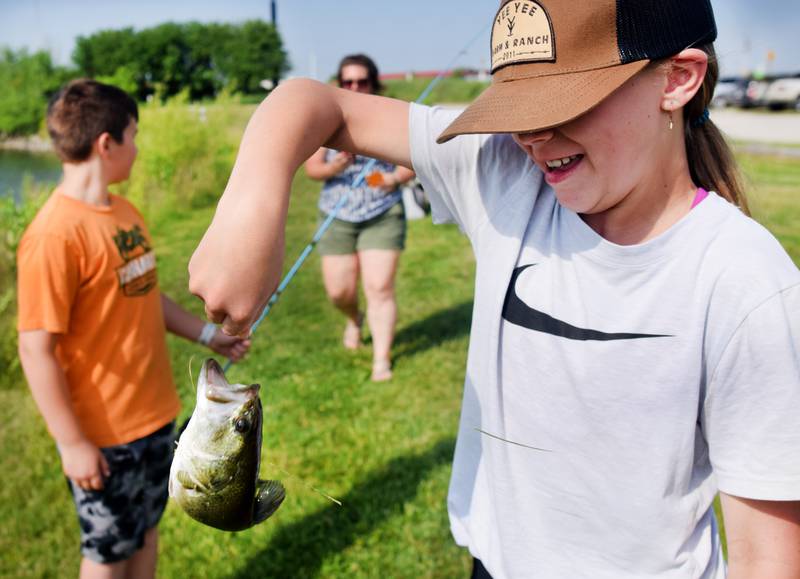 Young anglers catch bluegills and bass (and sometimes softshell turtles) during the Youth Fishing Derby on June 3 at Quarry Springs in Colfax.