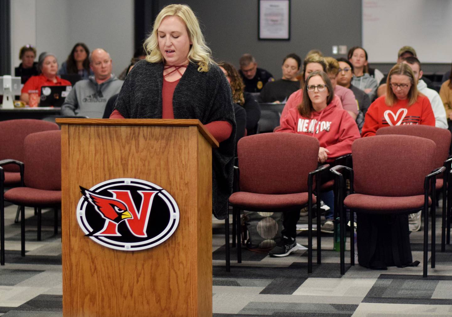 Jackie Carson, of Newton, on Monday, Nov. 13 speaks against the grade configuration decided upon by the school board last month, which convinced a number of families to sign petitions urging officials to reconsider their past action. Several other community members offered their perspective at the school board meeting.