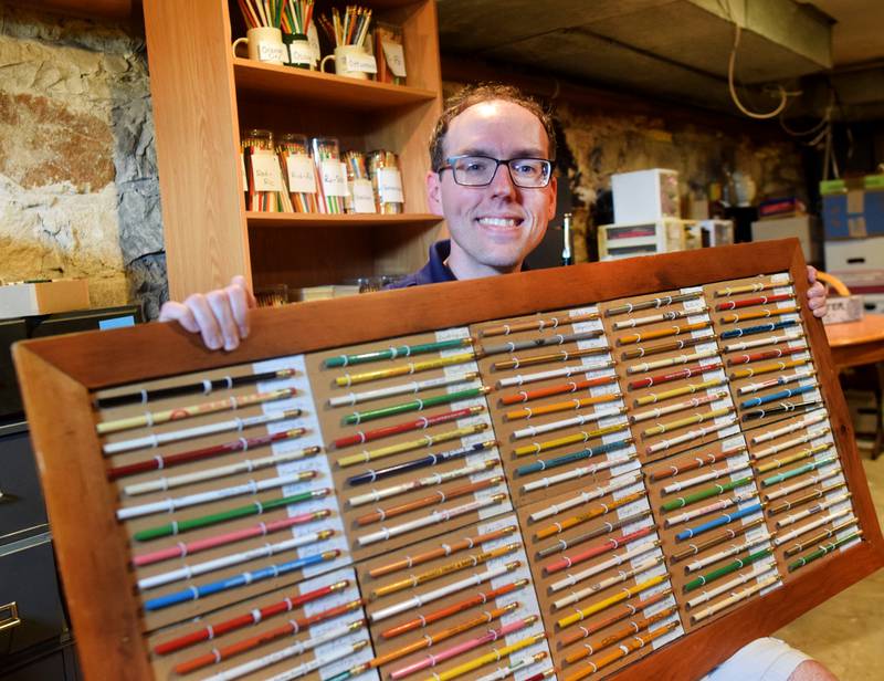 Aaron Bartholmey, a pencil collector from Colfax, speaks with guests at a July event at the Colfax Historical Society & Museum. As part of the event, Bartholmey held a public count of his massive collection to be submitted to Guinness World Records.