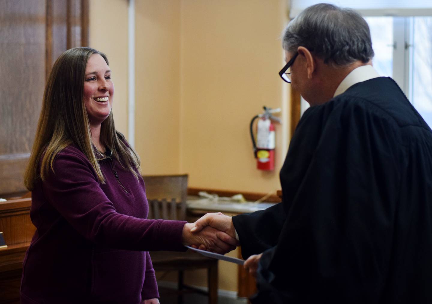 Jenna Jennings is congratulated after being sworn in as auditor of Jasper County before the board of supervisors meeting on Dec. 31 in the Jasper County Courthouse in Newton.