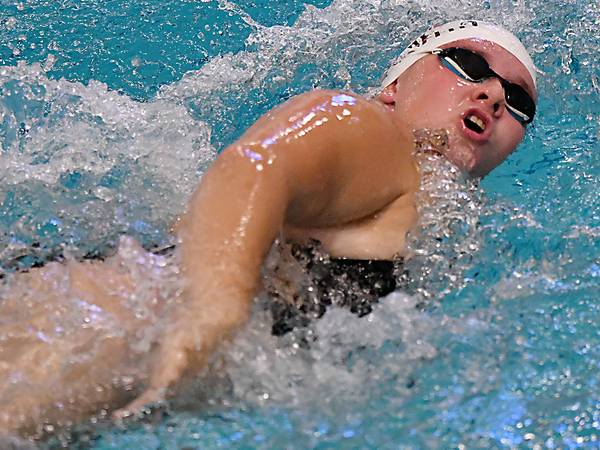 Cardinal swimmers cruise past Oskaloosa