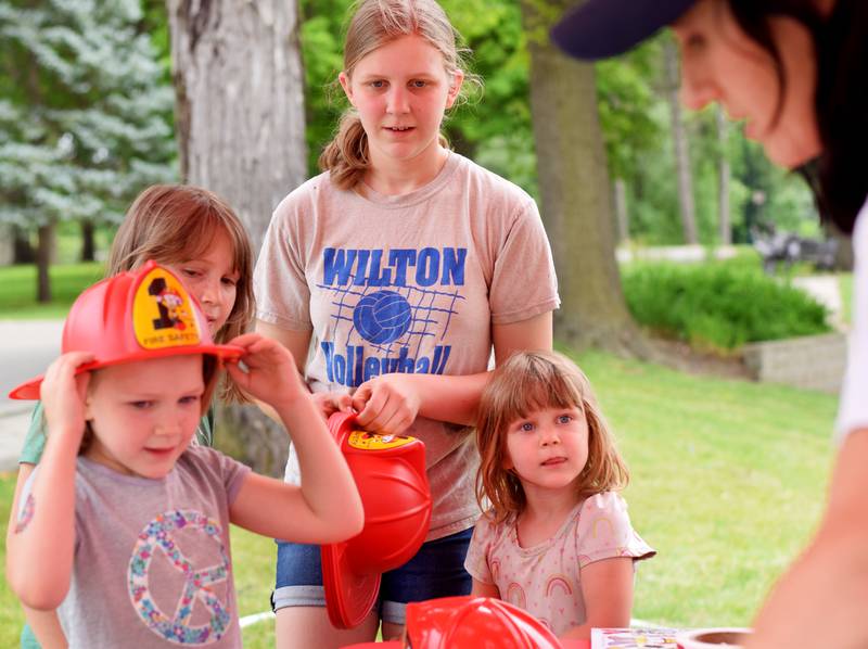 Local first responders show off emergency vehicles and have kids participate in an obstacle course as part of Safety Fest during Newton Fest on Saturday, June 10 at Maytag Park.