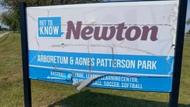 Newton reconsiders cheaper bid for city sign replacement project