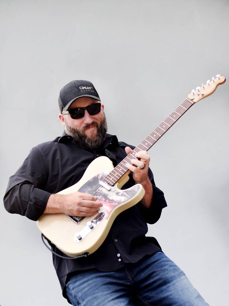 Damon Dotson, a Des Moines-based musician, performs the Maytag Bowl during the last night of Newton Fest on Saturday, June 10 at Maytag Park.