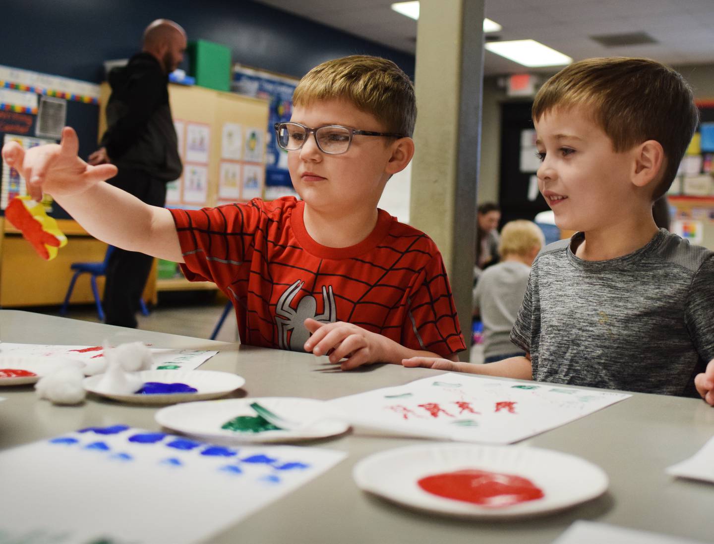 Preschoolers participate in learning activities using Peeps marshmallows as paint prints April 12 at the Newton YMCA.