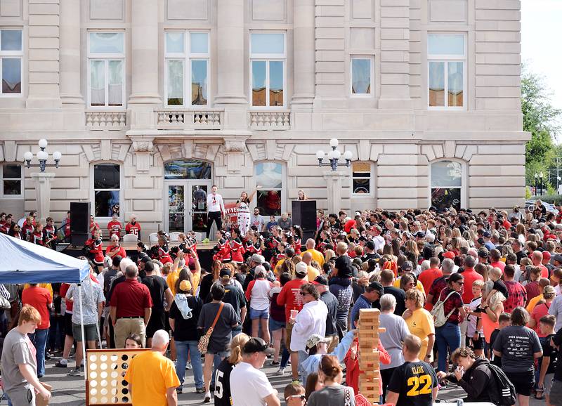 Newton Community School District staff and students hype up the crowds during the RVTV celebrations on Sept. 4 outside the Jasper County Courthouse.