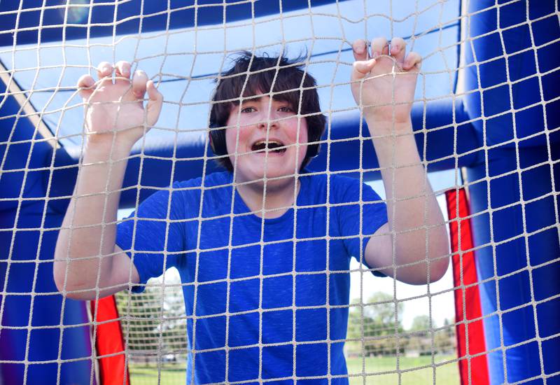 Eighth-grade students at Berg Middle School celebrate their last day as middle schoolers on May 26 by participating in carnival activities.