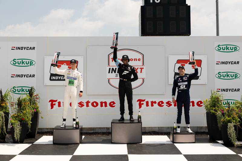 Myles Rowe, center, won the Indy NXT by Firestone on Saturday, July 12 at the Iowa Speedway in Newton. Photo by Travis Hinkle, Penske Entertainment.