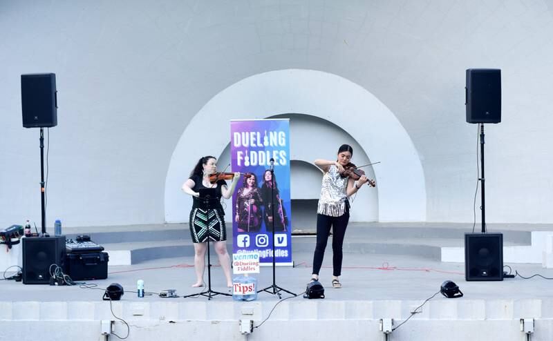 Dueling Fiddles, a Des Moines-based group featuring Hanna Wolle and Geneviève Gros-Louis Salamone, performed Thursday, June 8 as part of the Maytag Bowl Summer Concert Series in Newton.