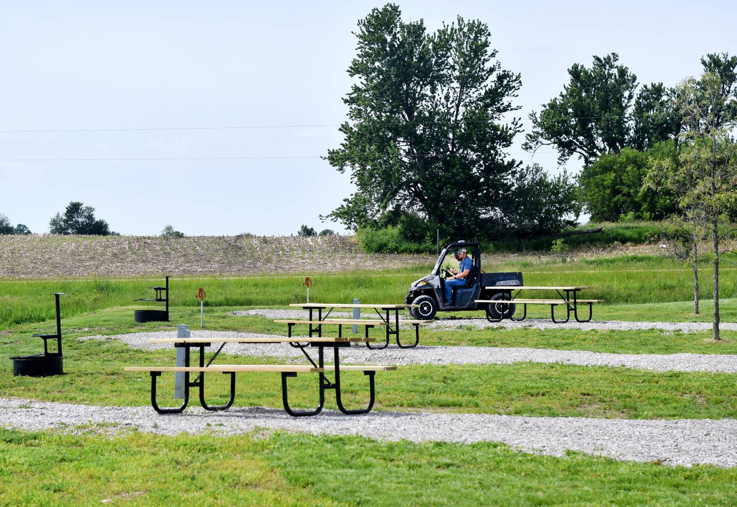 Bison Ridge Campground is furnished with modern utilities like electricity and water, and each site has a bench and a fire ring.