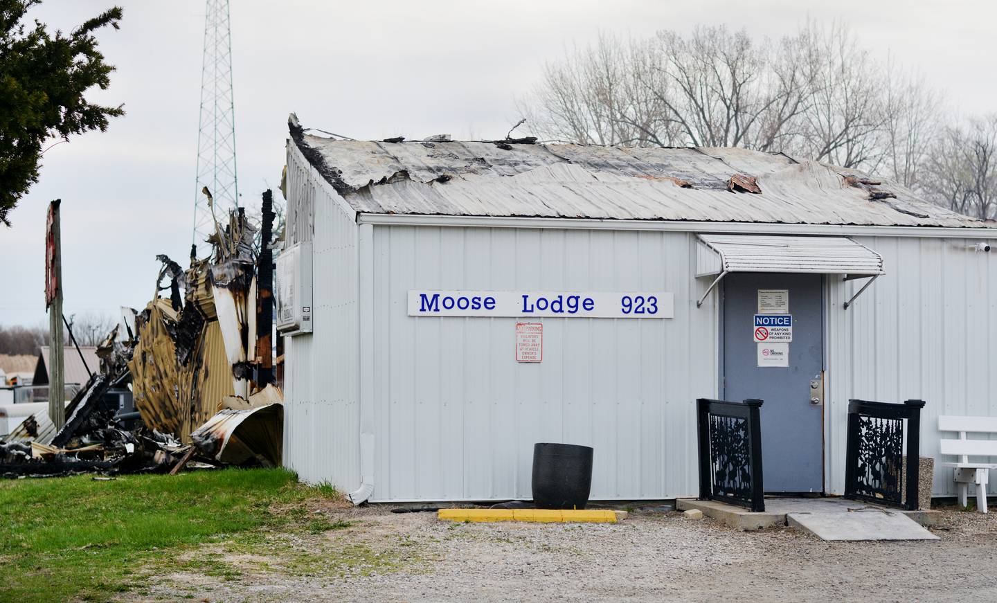 Despite the destruction of the Newton Moose Lodge #923, the front entrance of the exterior remains relatively untouched.