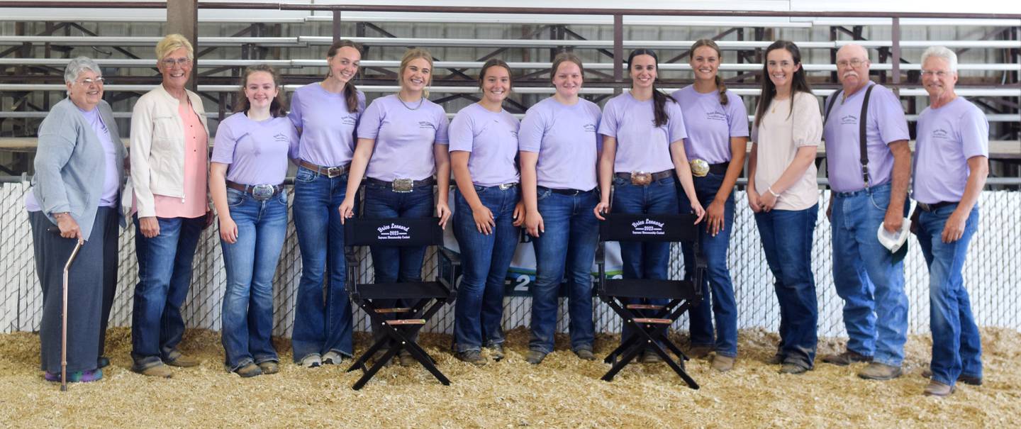 Competitors, judges and sponsors of the Brice Leonard Supreme Showmanship Contest pose for a picture with the champion showman and reserve champion showman on July 20 at the Jasper County Fair.
