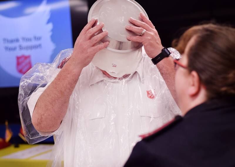 As a result of Rotary raising more funds for the Salvation Army than Kiwanis, Captain  Tim North voluntarily took a pie to the face during a volunteer recognition dinner April 19 at the organization's Newton headquarters.