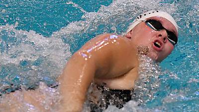 Cardinal swimmers cruise past Oskaloosa