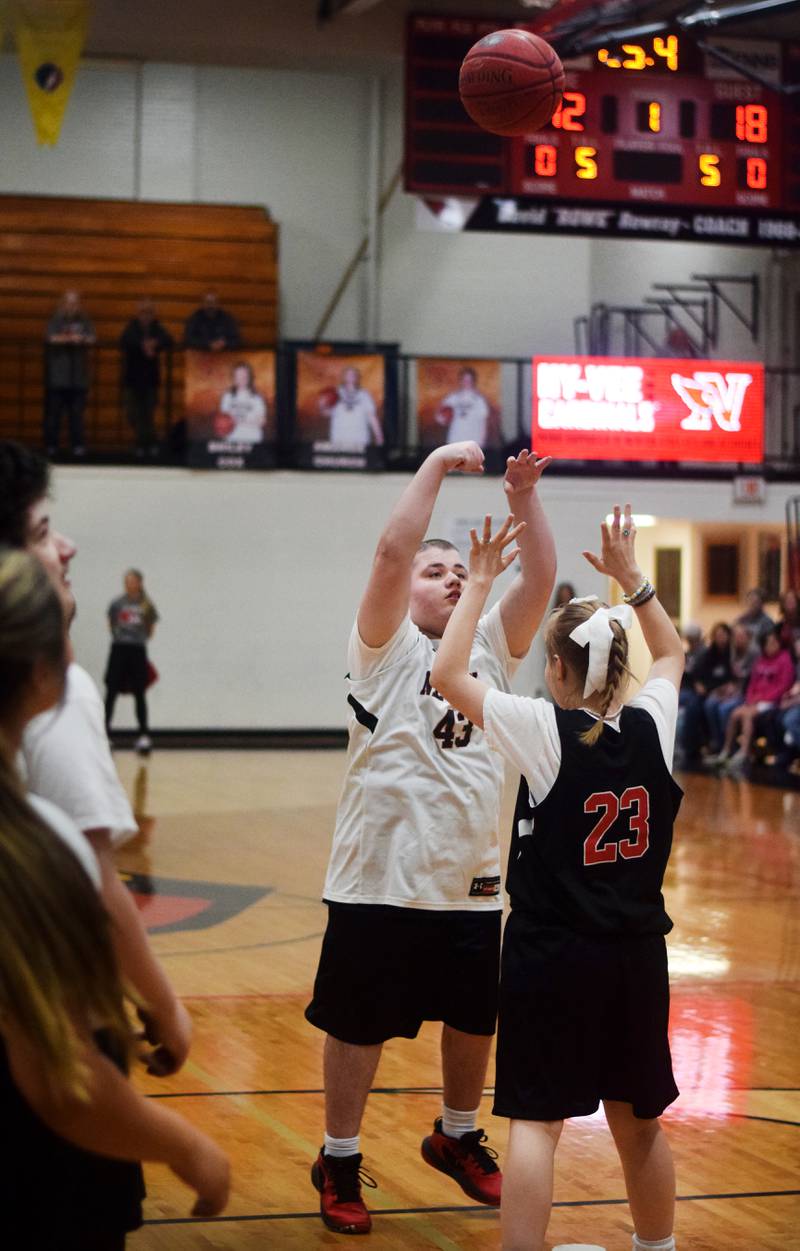 Maynard Meling shoots a two-pointer during The Big Game on April 19 at Newton High School.