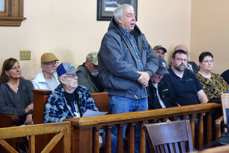 Bruce Brummel speaks in opposition to a rezoning request during a public hearing on March 21 in the chambers of the Jasper County Board of Supervisors.