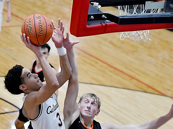 Slaughter’s career night powers Newton boys to win over Grinnell in season opener