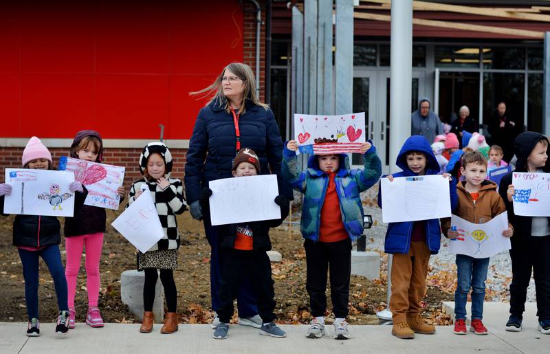 Newton Community School District students and staff participate in a Veterans Day Reverse Parade on Nov. 11, which extended to a number of school buildings in the area.