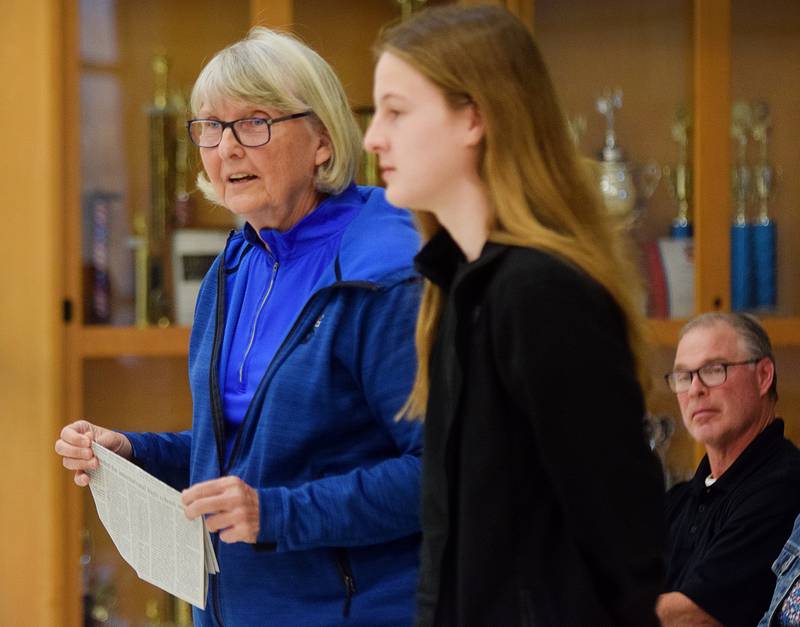 Ina Heidemann, left, and Hannes Klatt speak during the open forum portion of the Newton school board meeting on April 10 at Newton High School.