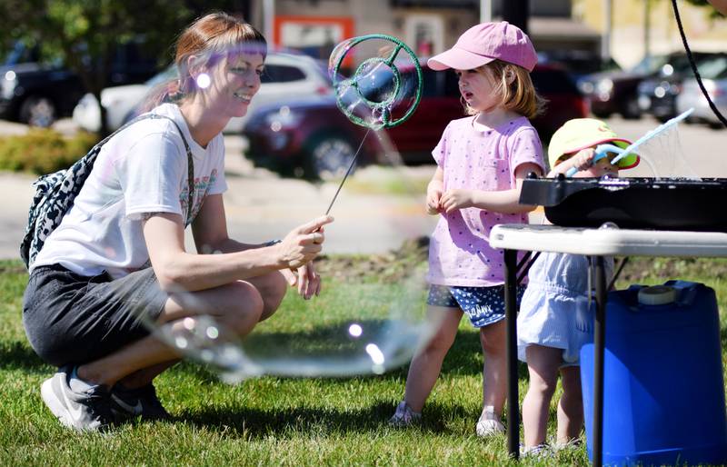 Lots of children participate in the Absolute Science Bubble Open House on June 20 at the Newton Public Library.