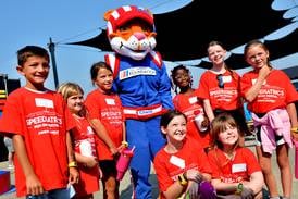 YMCA campers enjoy health and wellness activities in a NASCAR setting