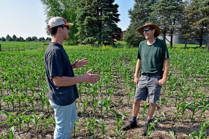 Iowa farmers like Jon Bakehouse (right) of Mills County are utilizing USDA-NRCS conservation programs to diversify their operations while simultaneously protecting and enhancing their natural resources, such as soil health, water quality and wildlife habitat.