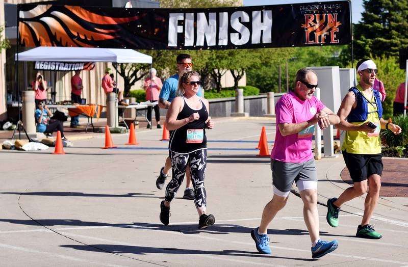 The Phoenix Phase Initiative hosted its fourth annual Run For Her Life 5K and half-marathon on May 11 in downtown Newton. The nonprofit has consistently seen high attendance at its yearly run to raise money to fight against human trafficking in Uganda.