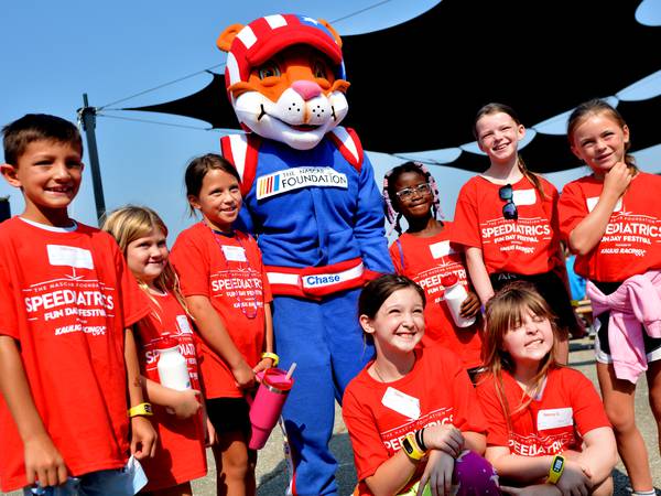 YMCA campers enjoy health and wellness activities in a NASCAR setting