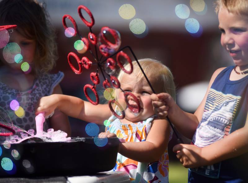 Lots of children participate in the Absolute Science Bubble Open House on June 20 at the Newton Public Library.