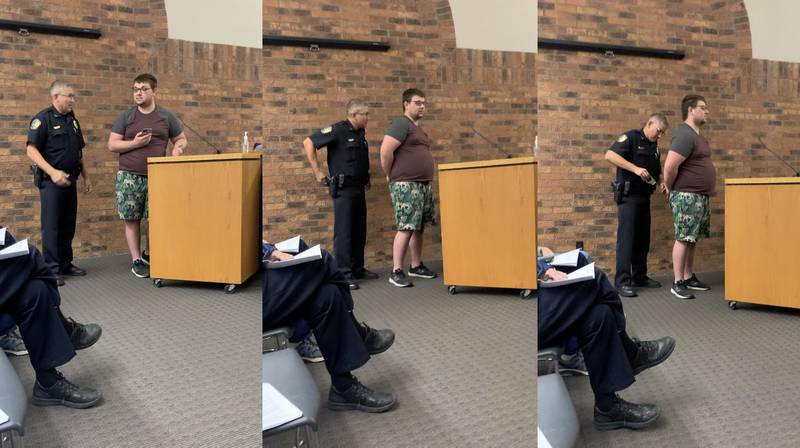 Screenshots of a video show Noah Petersen, 22, being arrested by Newton Police Chief Rob Burdess on Oct. 3 in the council chambers of city hall. Petersen was arrested for disorderly conduct after speaking critically of the city government and local police department.
