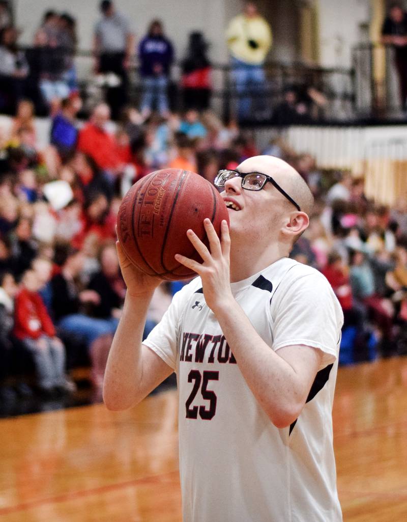 John Christy shoots a two-pointer during The Big Game on April 19 at Newton High School.