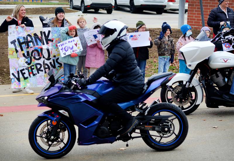 Newton Community School District students and staff participate in a Veterans Day Reverse Parade on Nov. 11, which extended to a number of school buildings in the area.