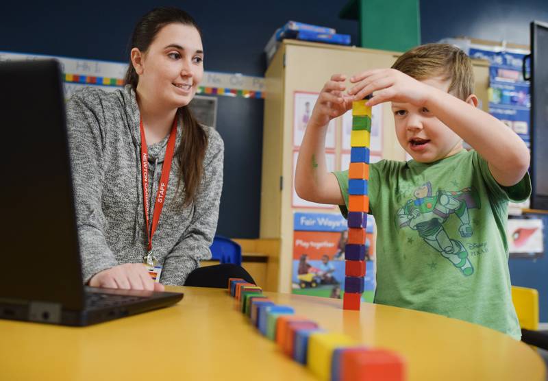 Preschoolers participate in learning activities April 12 at the Newton YMCA. The Newton Community School District extended its agreement with the YMCA to offer a universal preschool curriculum.