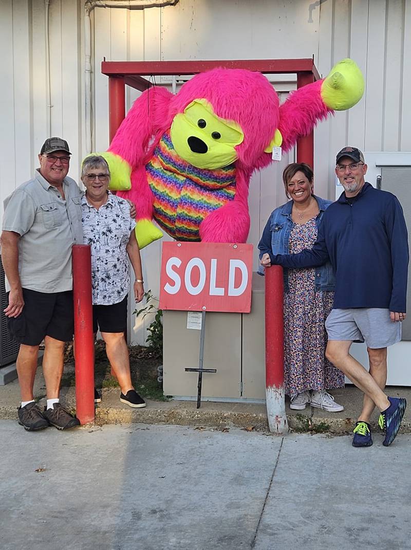 Pete and Priscilla Peterson with Ana and Tim Sublette, who recently purchased Monroe Foods from the long-time owners.