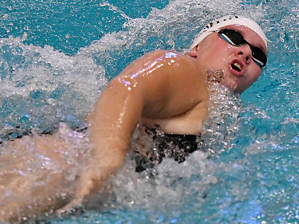 Cardinal swimmers cruise past Oskaloosa