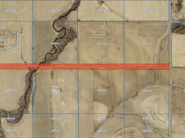 Farmers oppose road reclassification of N. 75th Ave. W.
