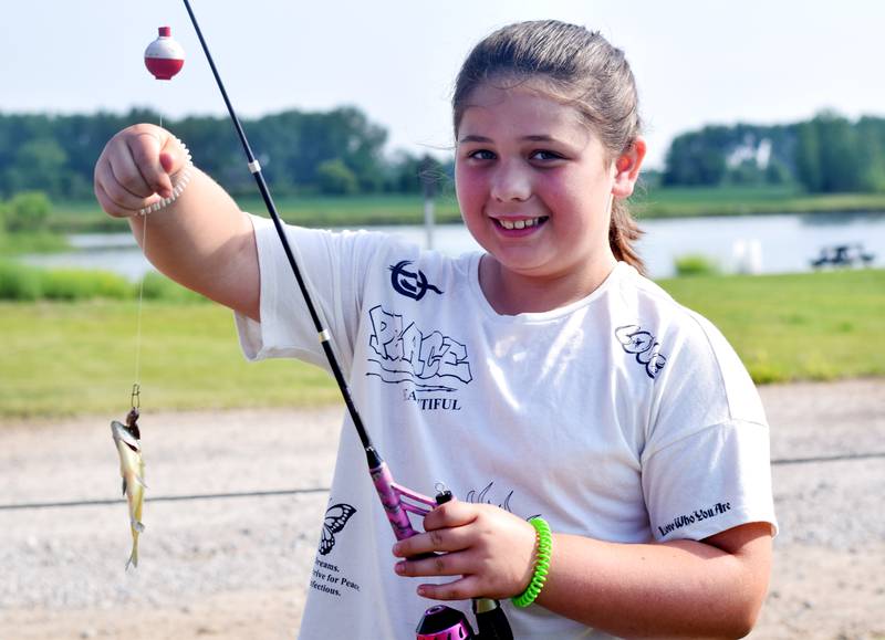 Young anglers catch bluegills and bass (and sometimes softshell turtles) during the Youth Fishing Derby on June 3 at Quarry Springs in Colfax.