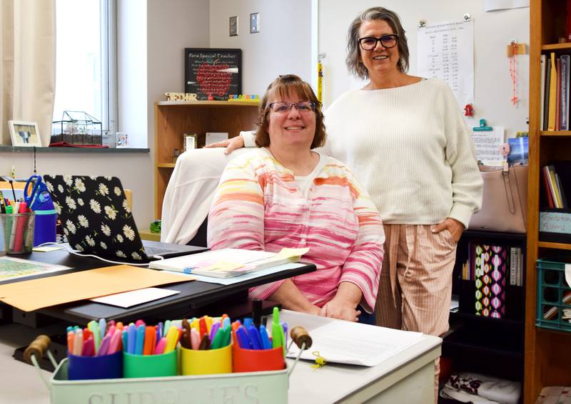 From left: level three special education teachers Tina Stammeyer and Lori Gilmore stand inside a classroom on May 2 in the Newton High School. Stammeyer and Gilmore regularly organize "The Big Game," an annual basketball game played by special education students, their peer helpers and some student athletes.
